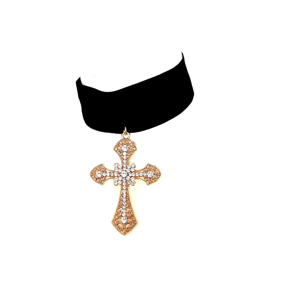 Black velvet choker necklace with gold and crystal cross pendant on white background